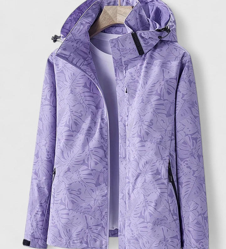 Tjaša – Elegantna vetrovka z botaničnim vzorcem